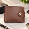 Genuine cow leather men’s wallet in black and brown with snap closure